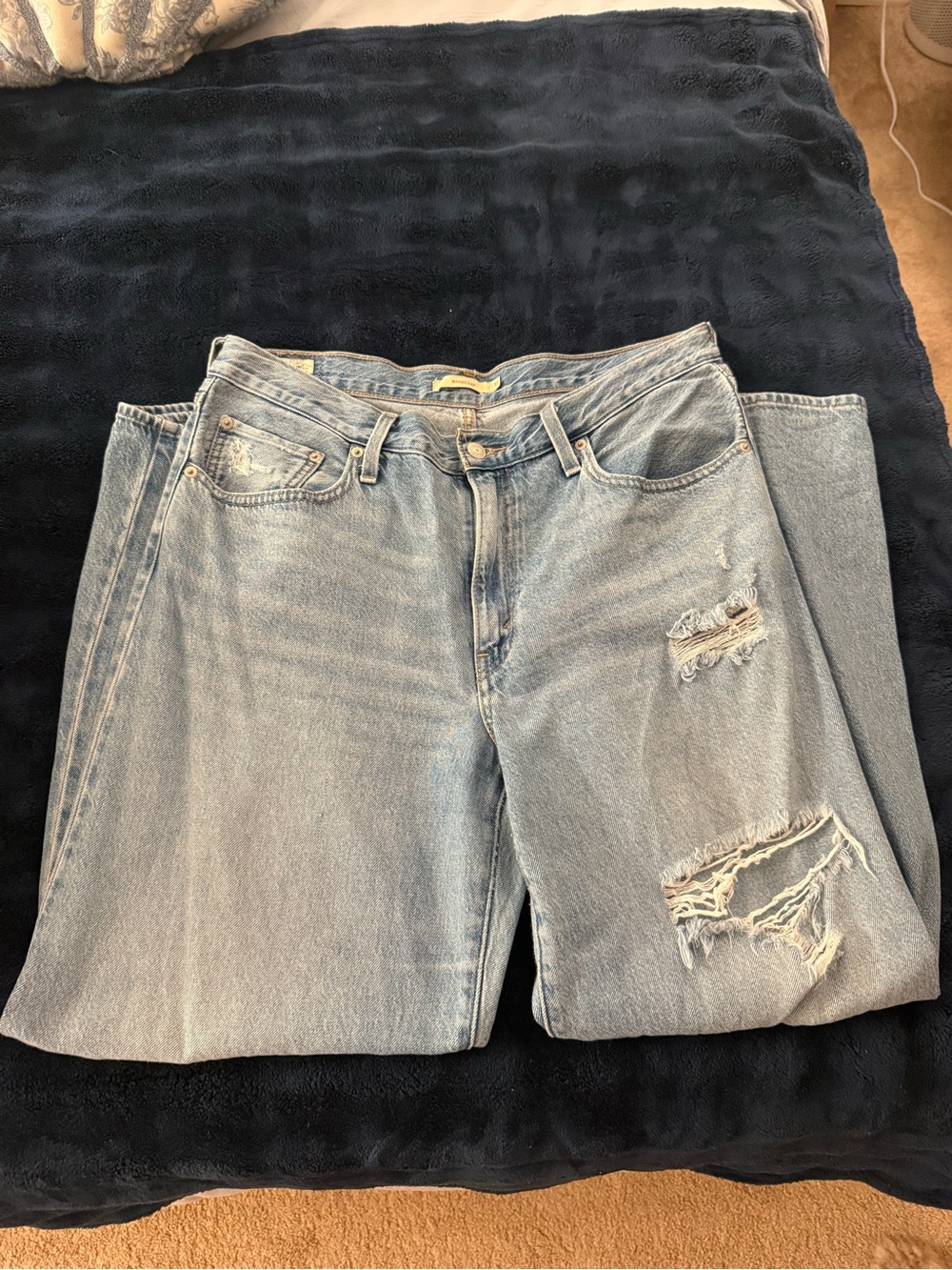 Levi's Faded Light Blue Distressed Boyfriend Jeans
